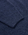 Blau melierter Pullover aus Bouclé-Wolle mit Rundhalsausschnitt